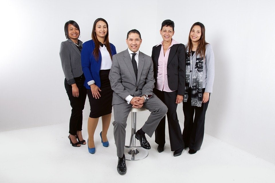 A team of satisfied employees in the workplace
