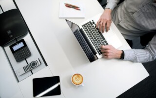 A Person Working at Office Desk