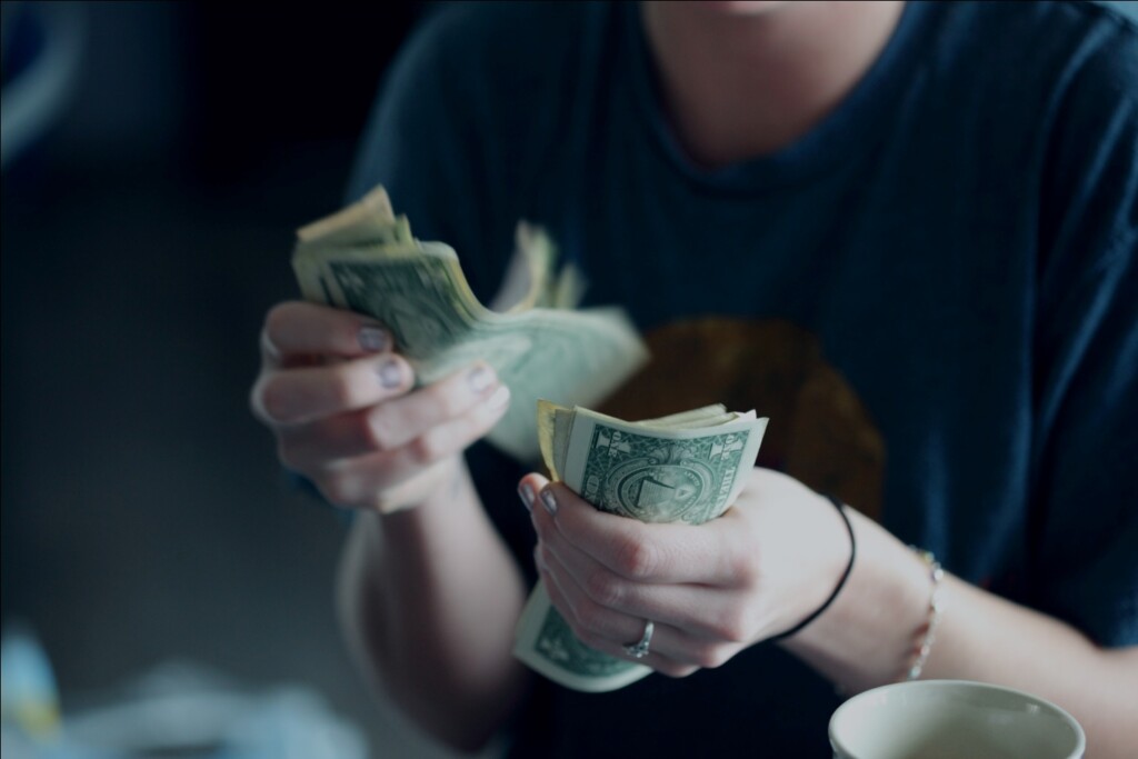 A Woman Counting Cash