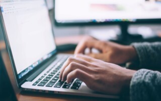 Man writing a Job Ad