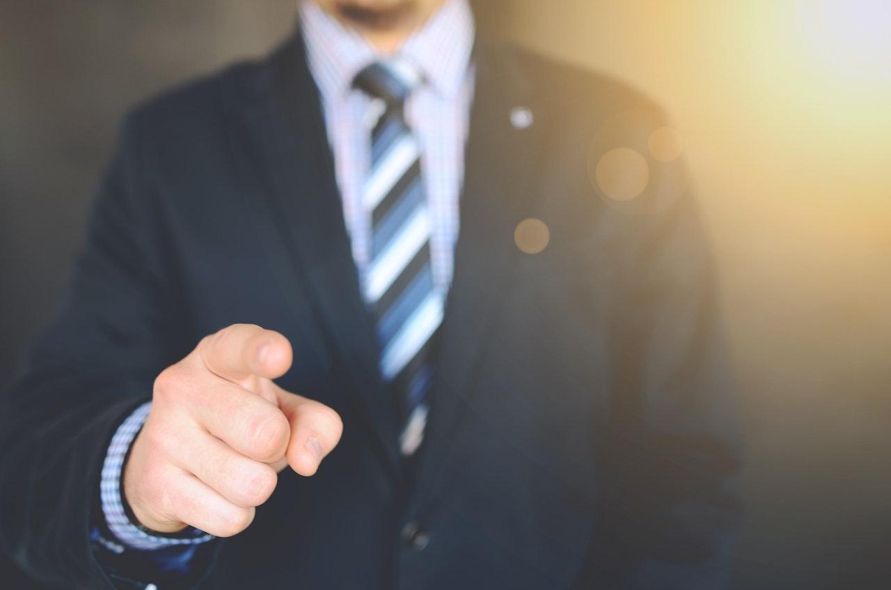 A Man in a Blue Business Suit