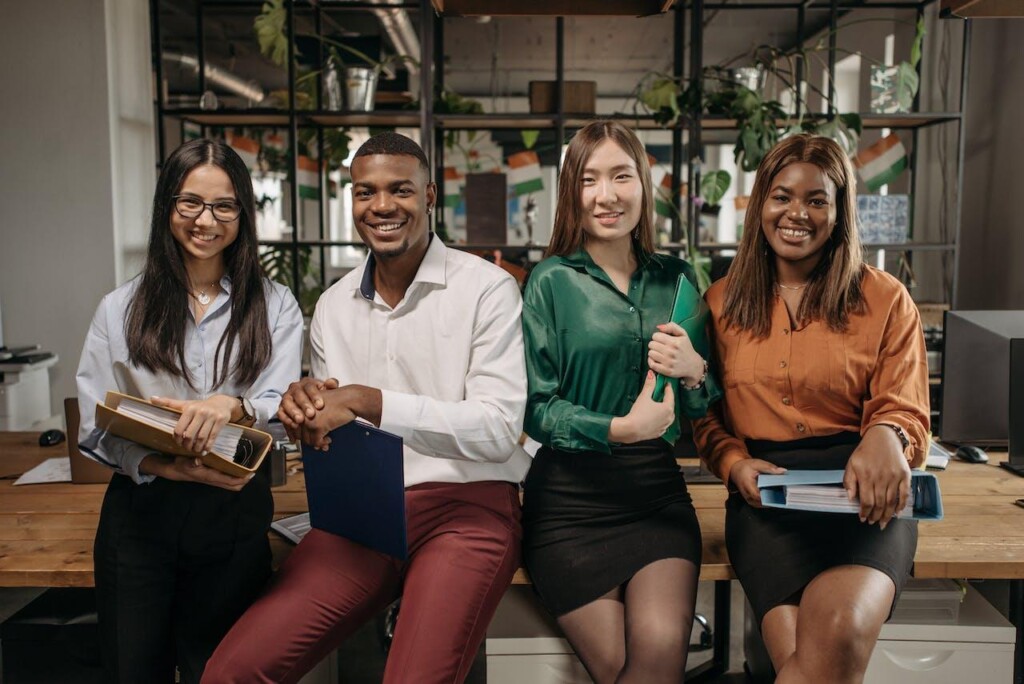 Employees Sitting on a Table