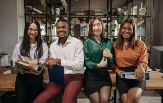Employees Sitting on a Table