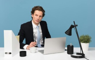 An Employee Sitting at His Desk